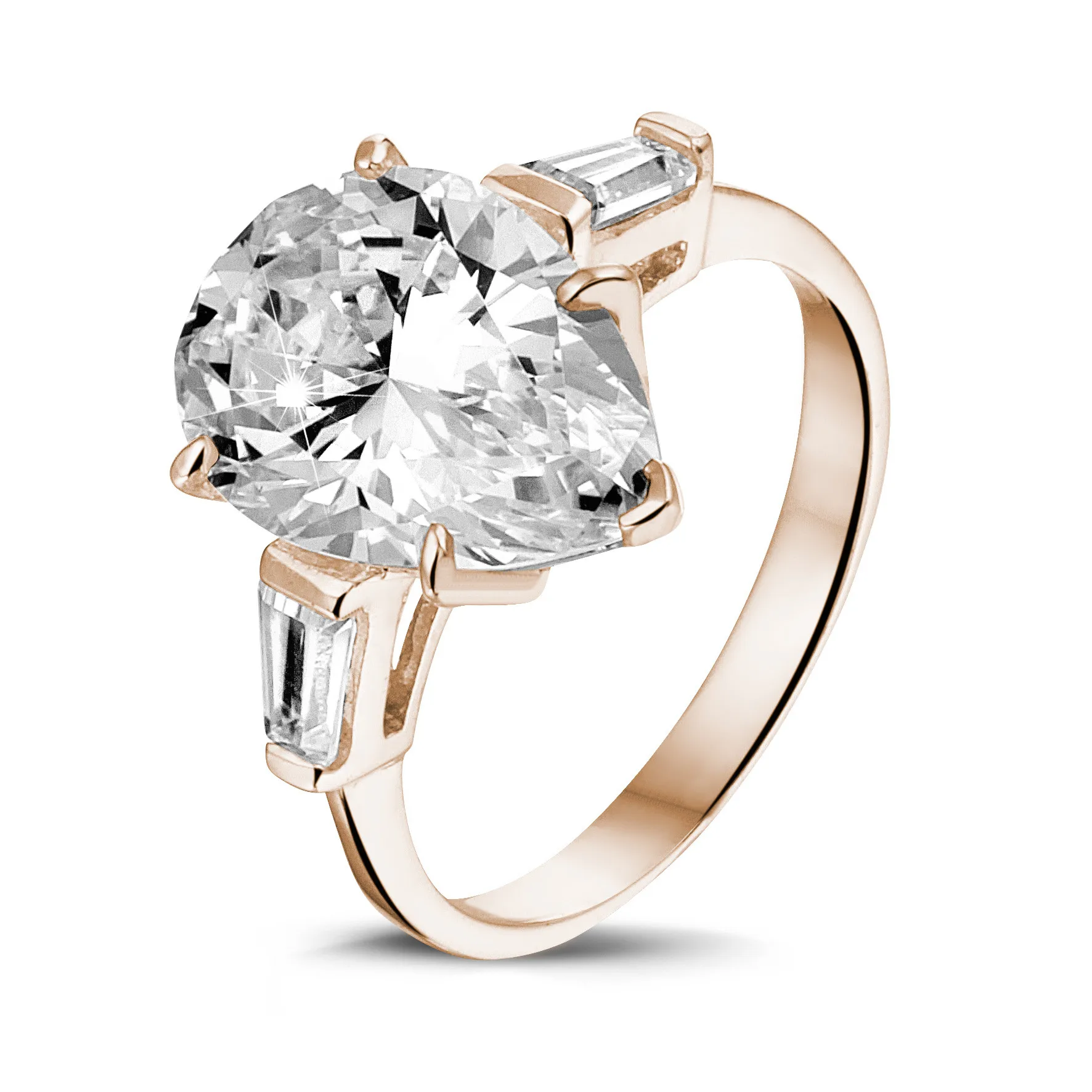 Anillo en oro rojo con diamante en forma de pera y diamantes talla baguette cónico 