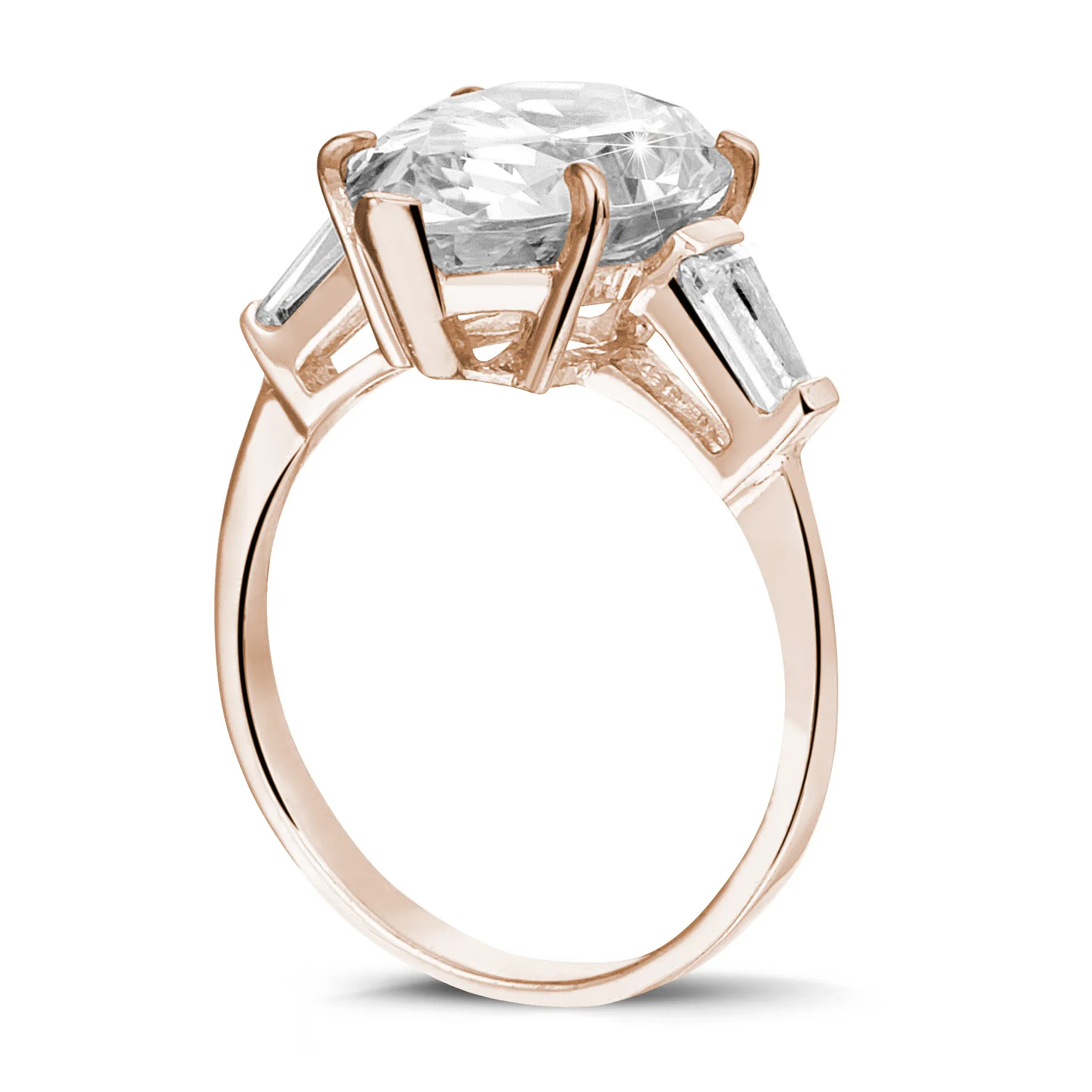 Anillo en oro rojo con diamante en forma de pera y diamantes talla baguette cónico 