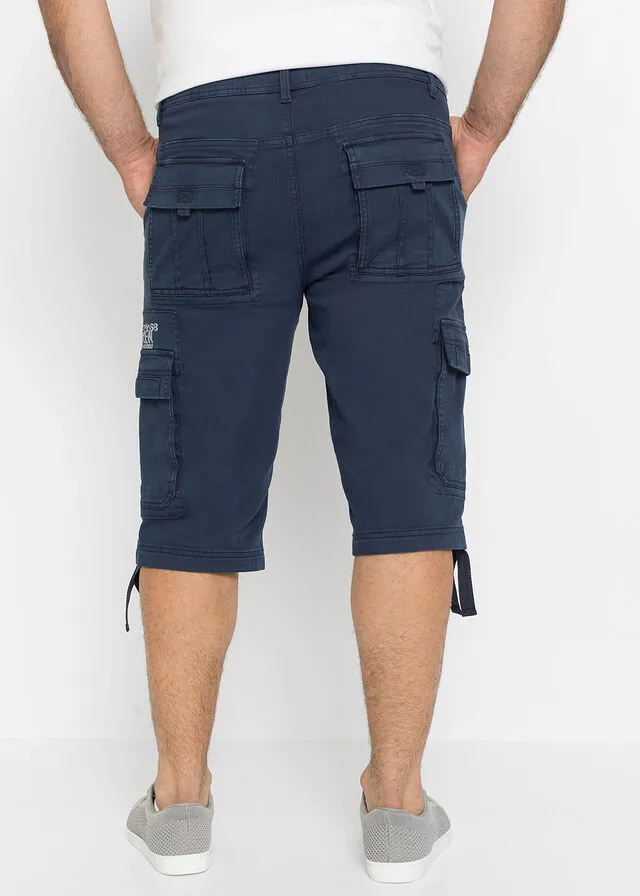 Bermudas largas con bolsillos cargo, corte regular Negro estampado
