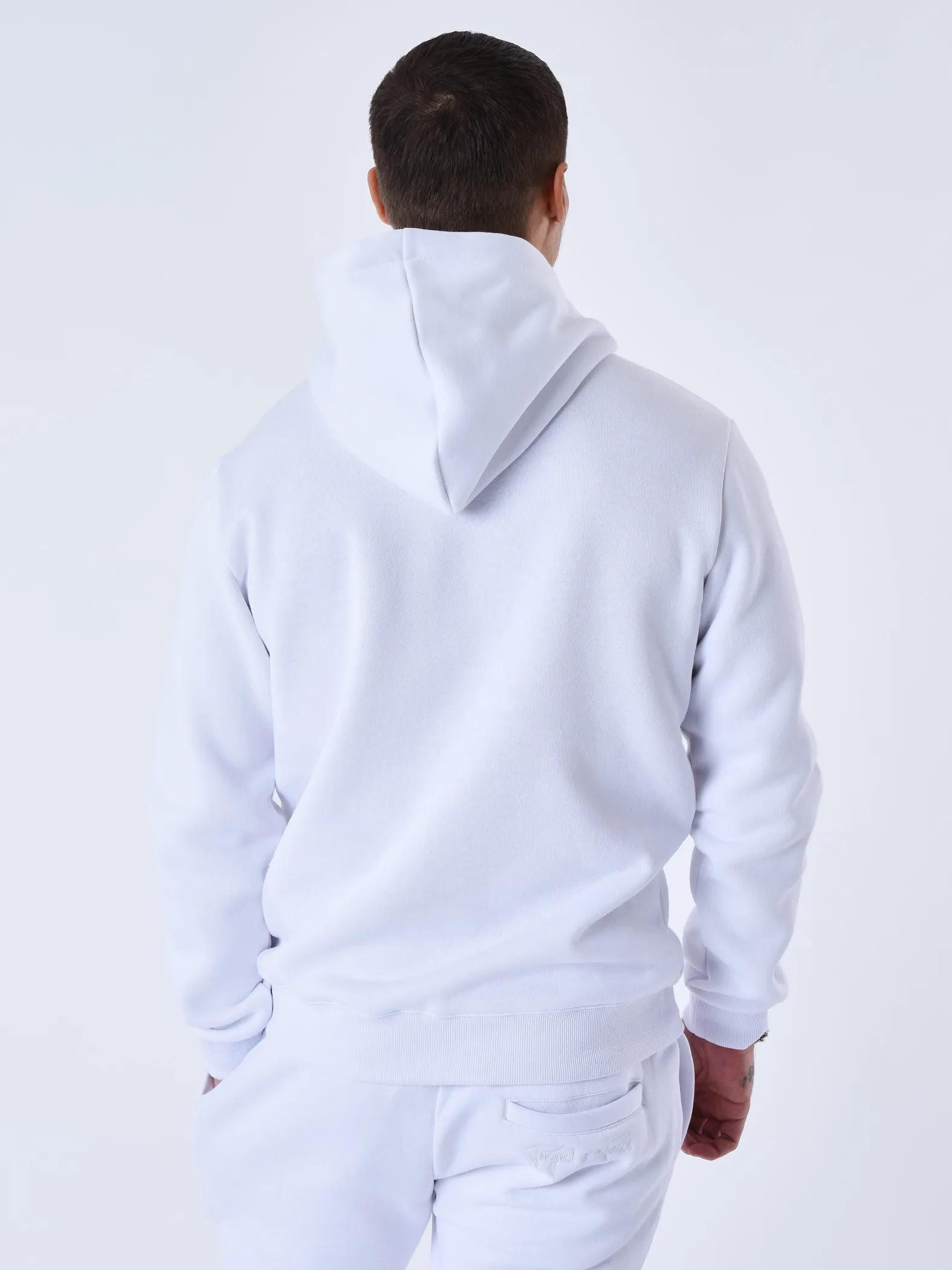 Chaqueta con capucha e inserción bimaterial