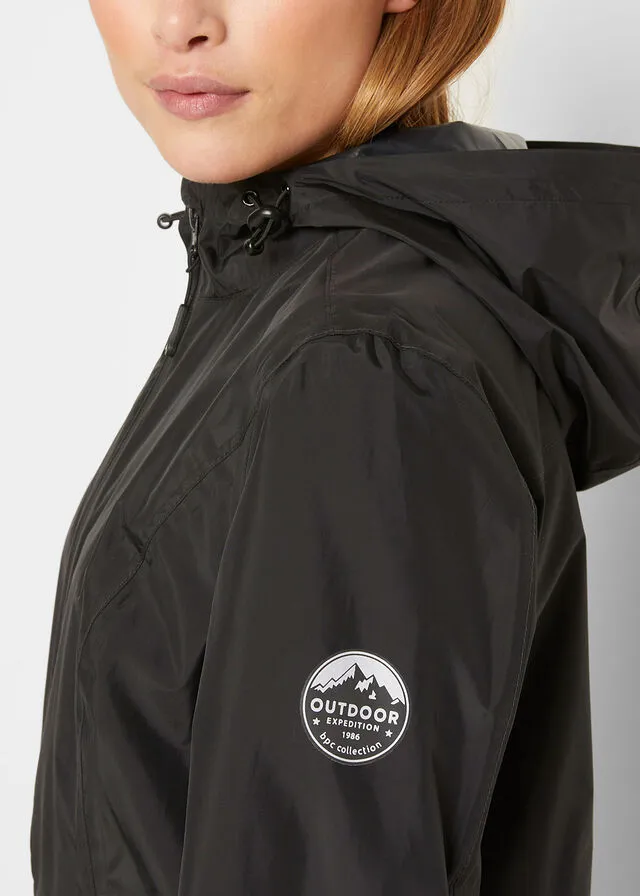 Chubasquero ultraligero con bolsillo integrado Negro