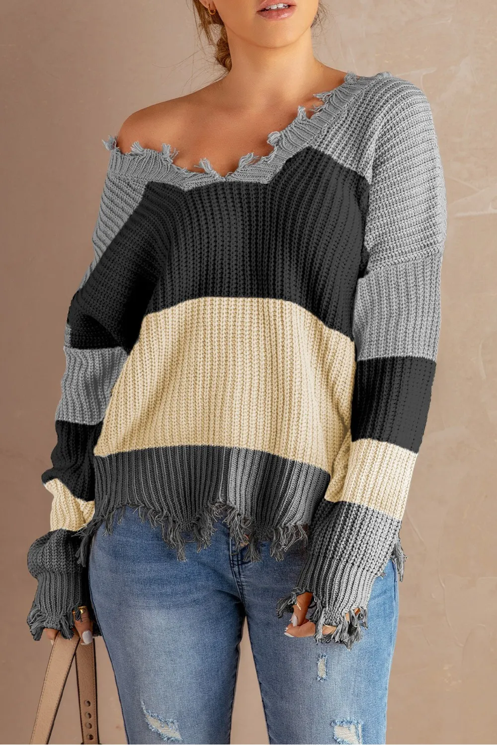 Jersey gris claro con efecto desgastado