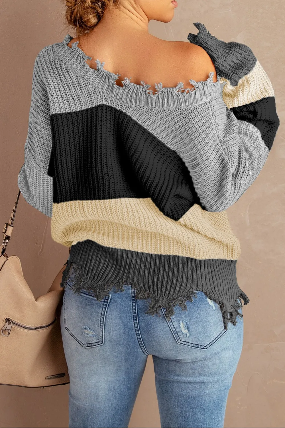 Jersey gris claro con efecto desgastado