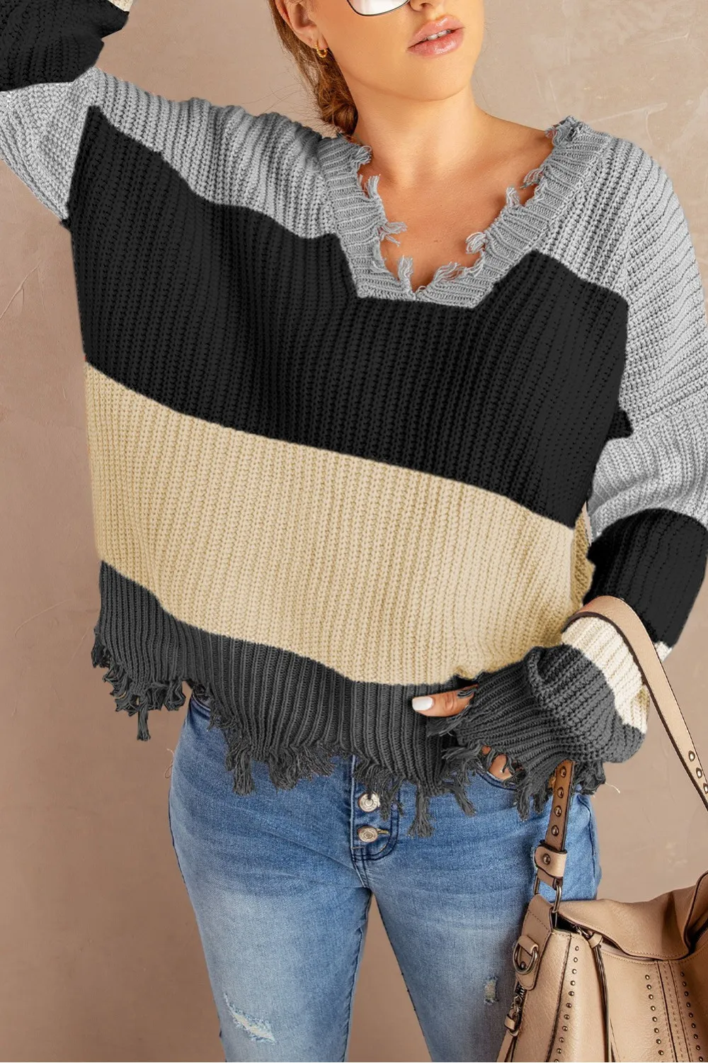Jersey gris claro con efecto desgastado