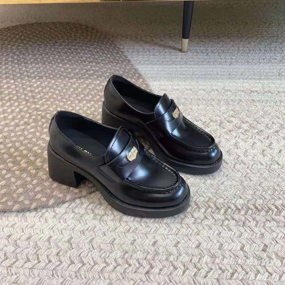 MIU MIU MOCASINES PENNY MUJER DE PIEL CON TACóN DE 75MM DE ALTURANEGRO