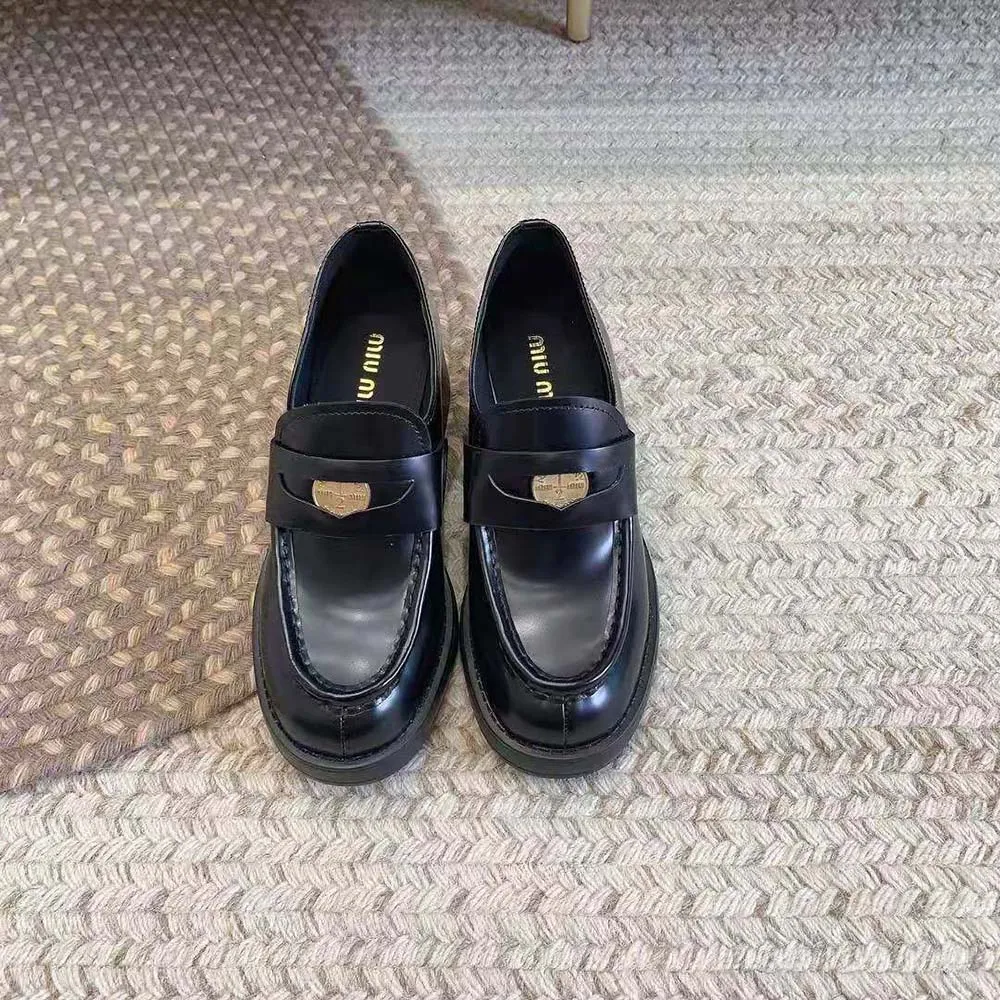 MIU MIU MOCASINES PENNY MUJER DE PIEL CON TACóN DE 75MM DE ALTURANEGRO