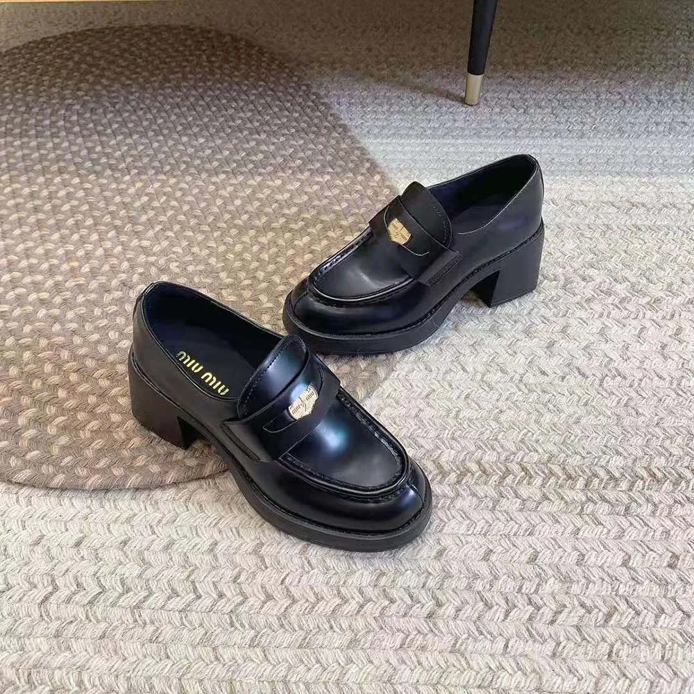 MIU MIU MOCASINES PENNY MUJER DE PIEL CON TACóN DE 75MM DE ALTURANEGRO