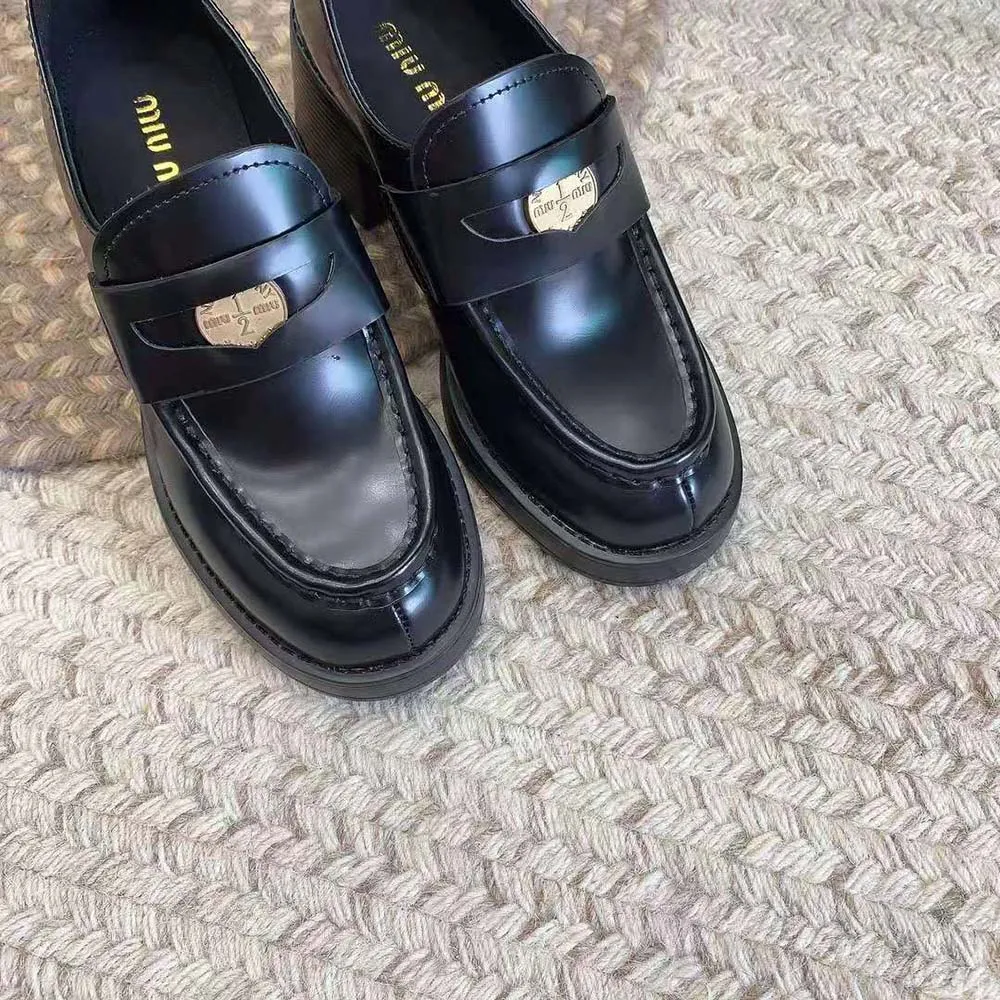 MIU MIU MOCASINES PENNY MUJER DE PIEL CON TACóN DE 75MM DE ALTURANEGRO