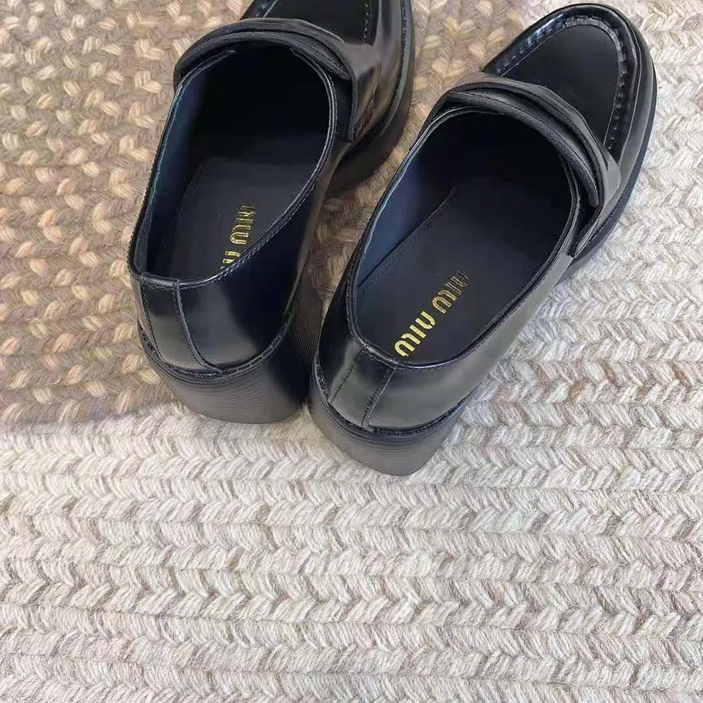 MIU MIU MOCASINES PENNY MUJER DE PIEL CON TACóN DE 75MM DE ALTURANEGRO