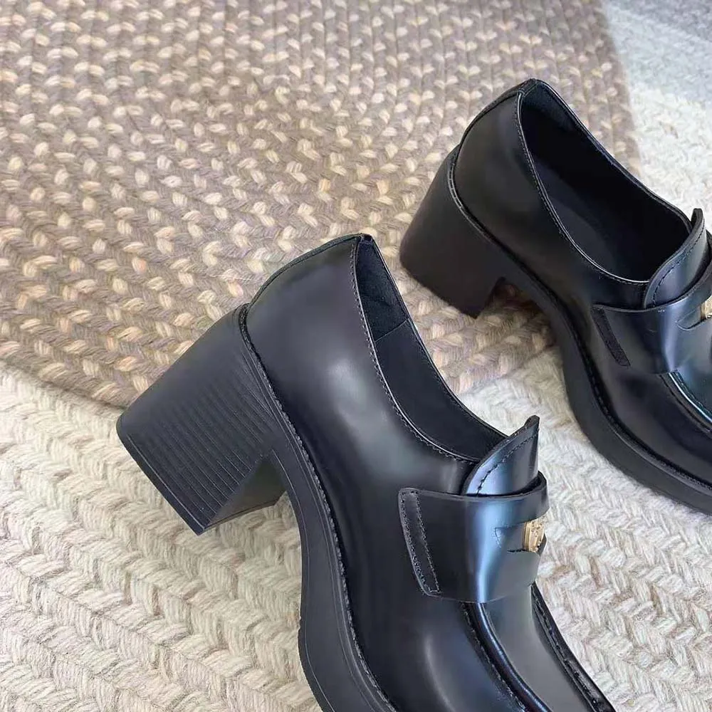 MIU MIU MOCASINES PENNY MUJER DE PIEL CON TACóN DE 75MM DE ALTURANEGRO