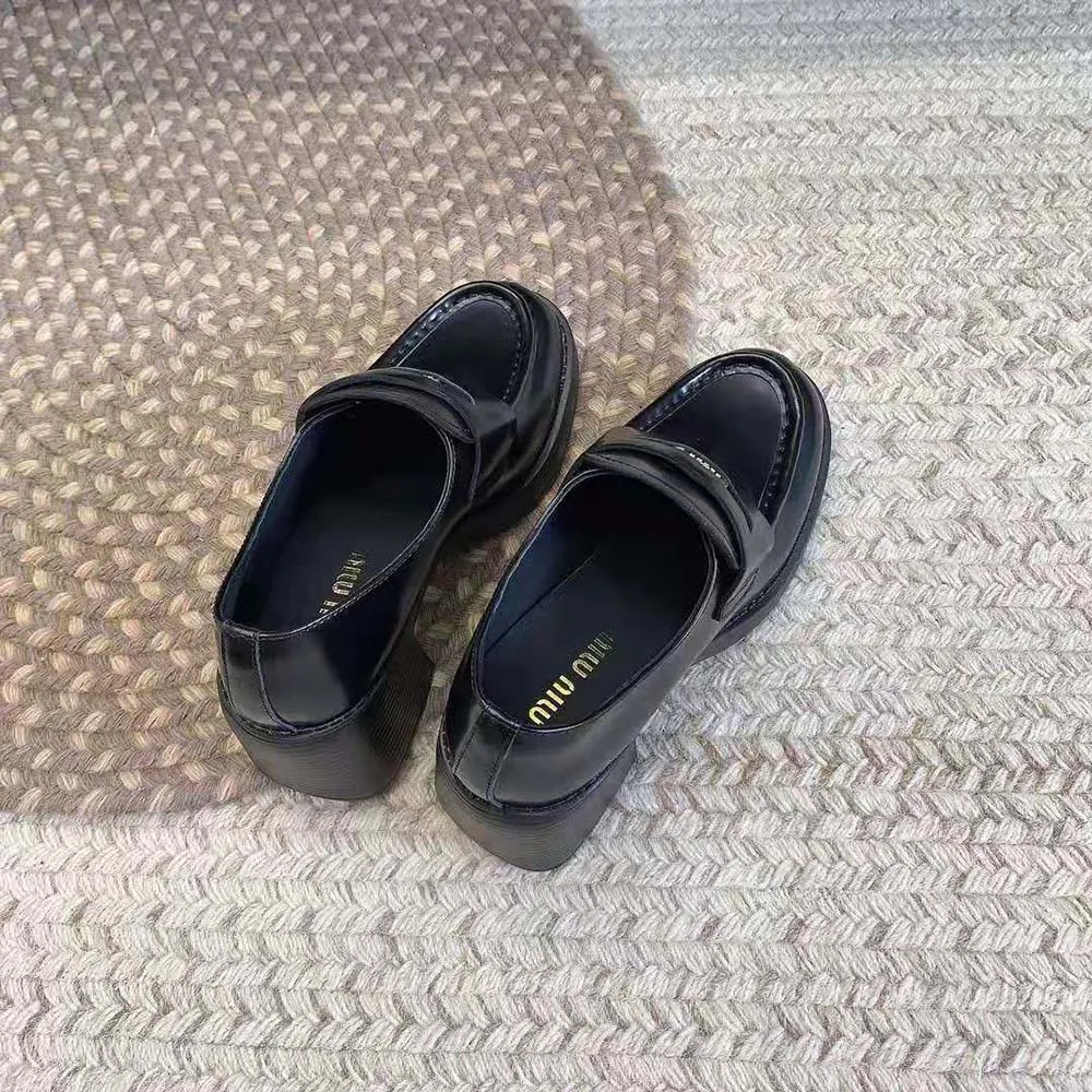 MIU MIU MOCASINES PENNY MUJER DE PIEL CON TACóN DE 75MM DE ALTURANEGRO