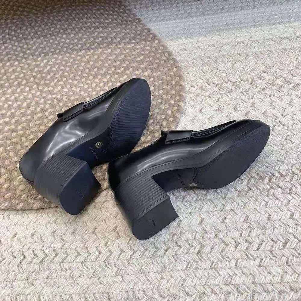 MIU MIU MOCASINES PENNY MUJER DE PIEL CON TACóN DE 75MM DE ALTURANEGRO