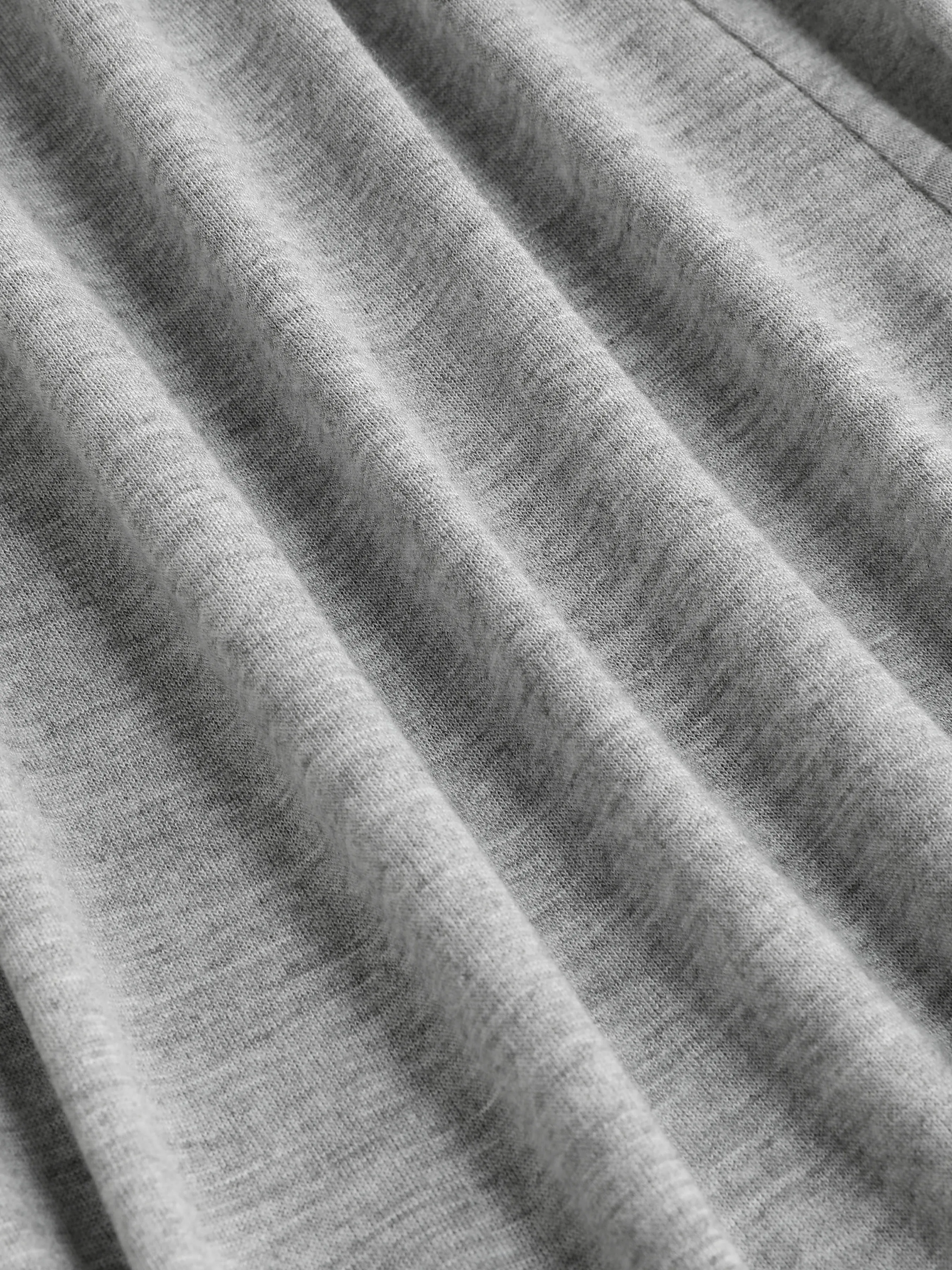  Pantalones anchos de cintura alta con volantes de jersey sólido