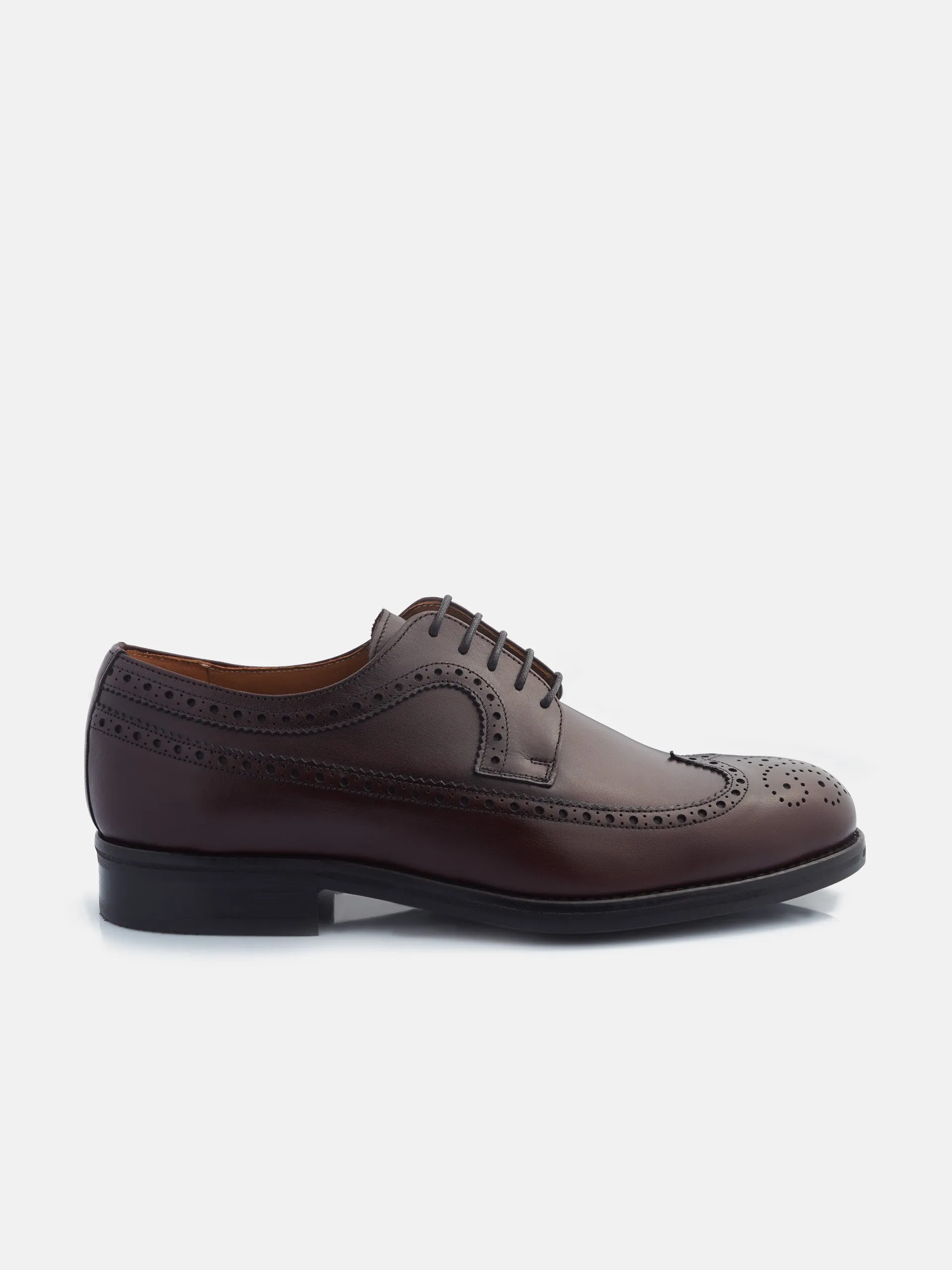 Zapato clasico piel perforado burdeos